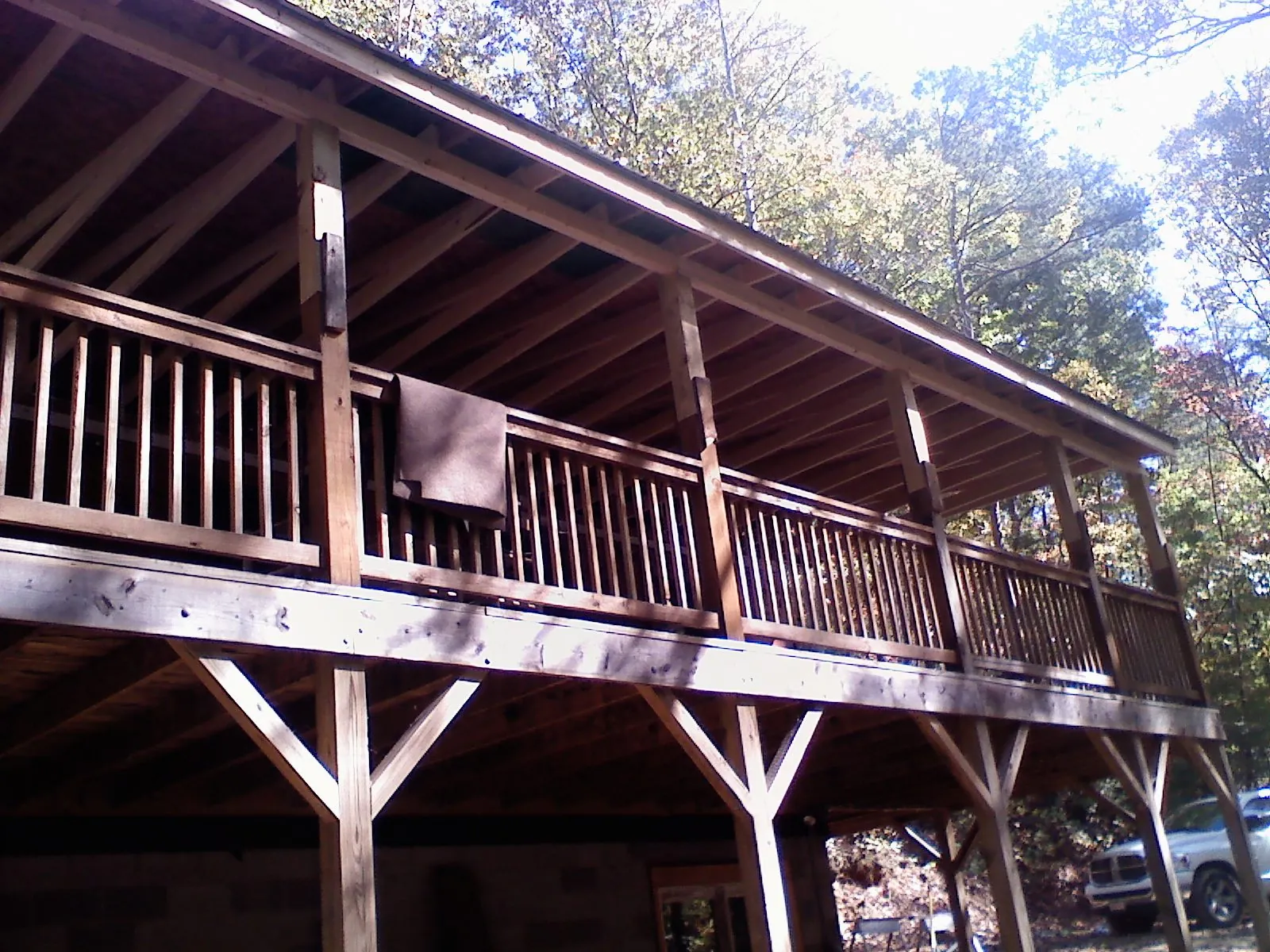 Timber framing under a new elevated porch and deck — Roof Leak Repair in South Beloit by Roofing Brothers
